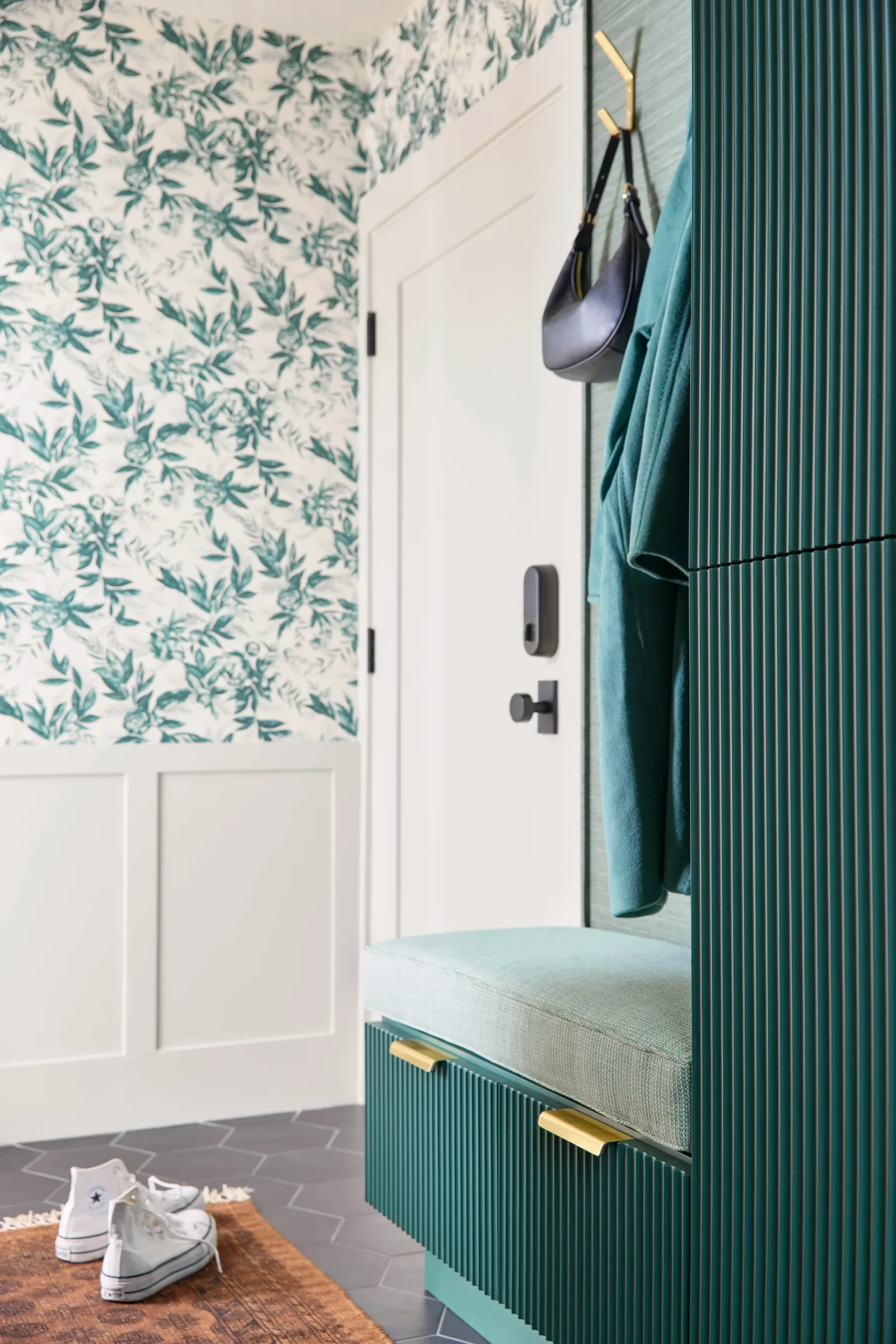 Mudroom bench in fluted green casework at Quisisana, Kentfield