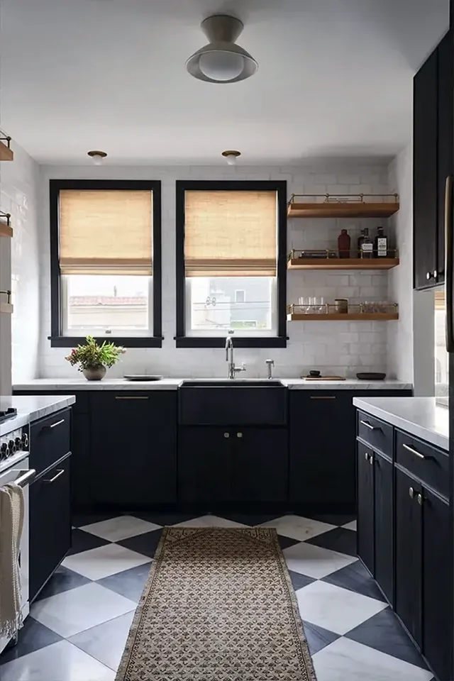 Finished kitchen with dark cabinetry and a checkerboard tile floor