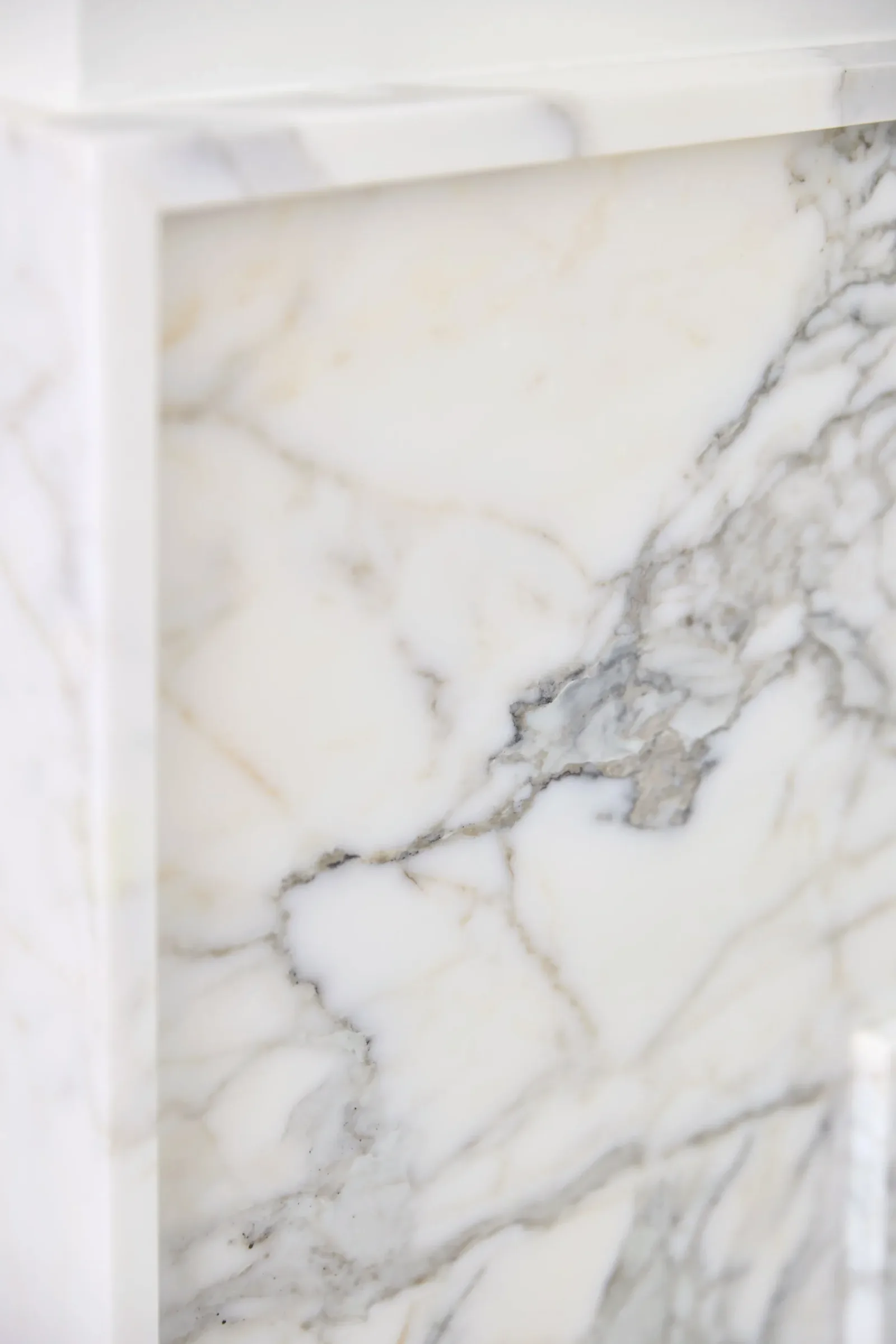 Book-matched marble slab used at the fireplace