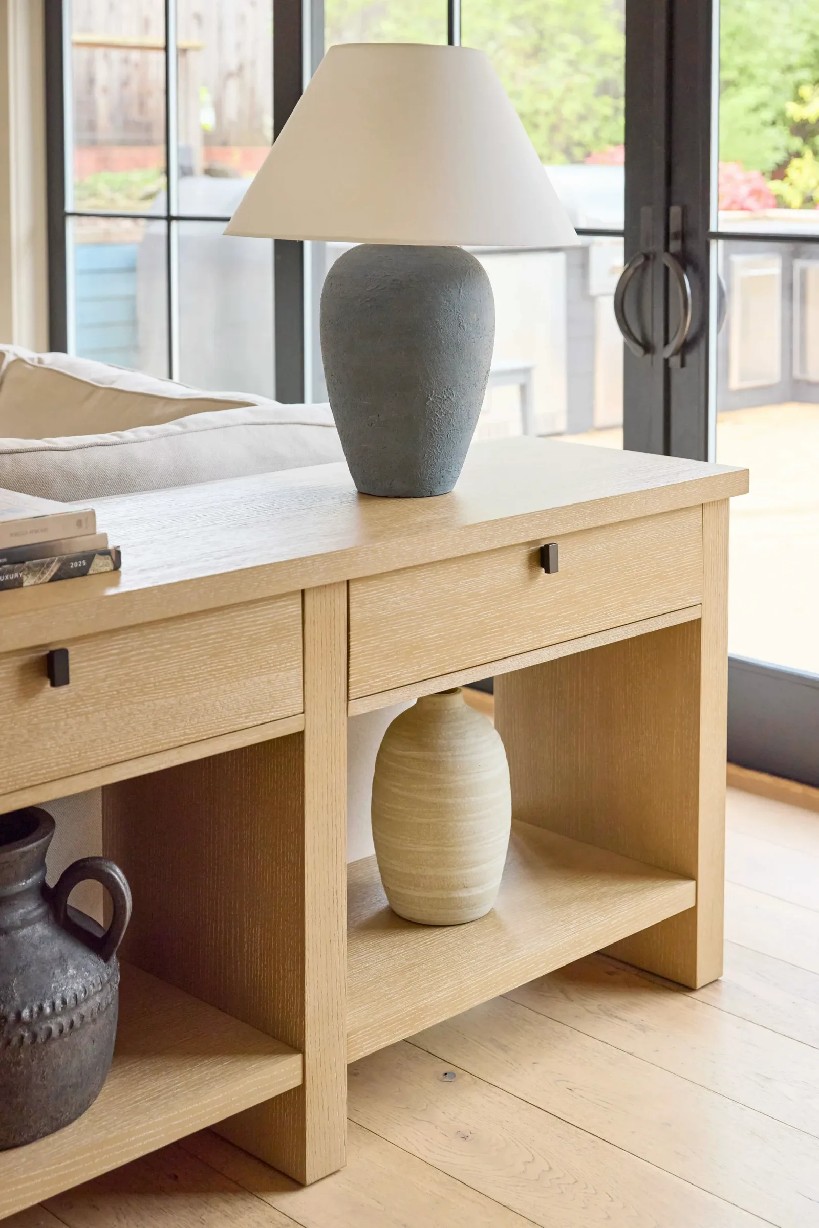 White oak console table detail at the window, drawer and shelf